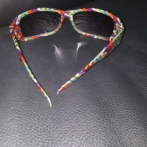 Sunglasses.  Assorted. Decorated ear pieces.